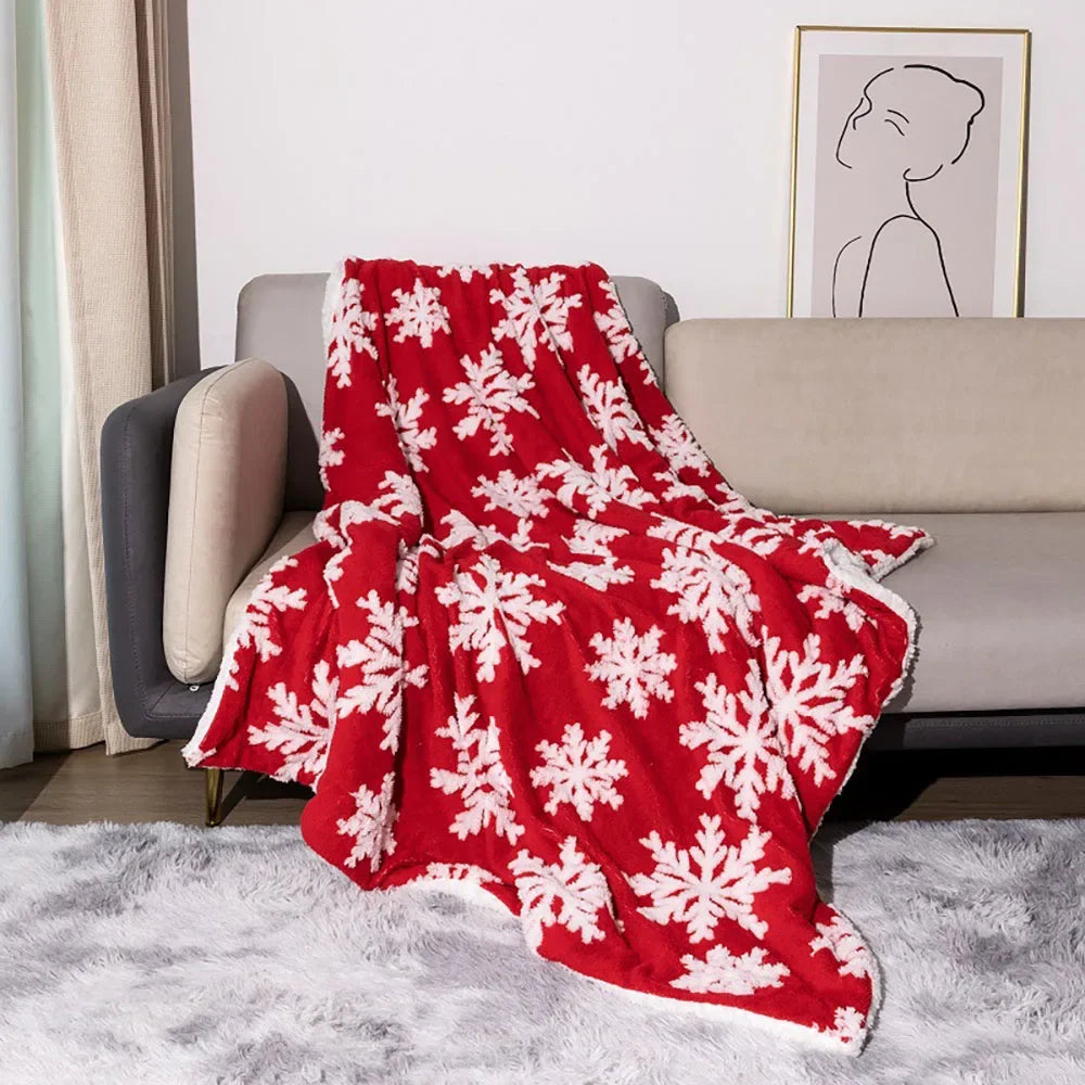 Julepledd i fleece og lammeull med snøkrystaller