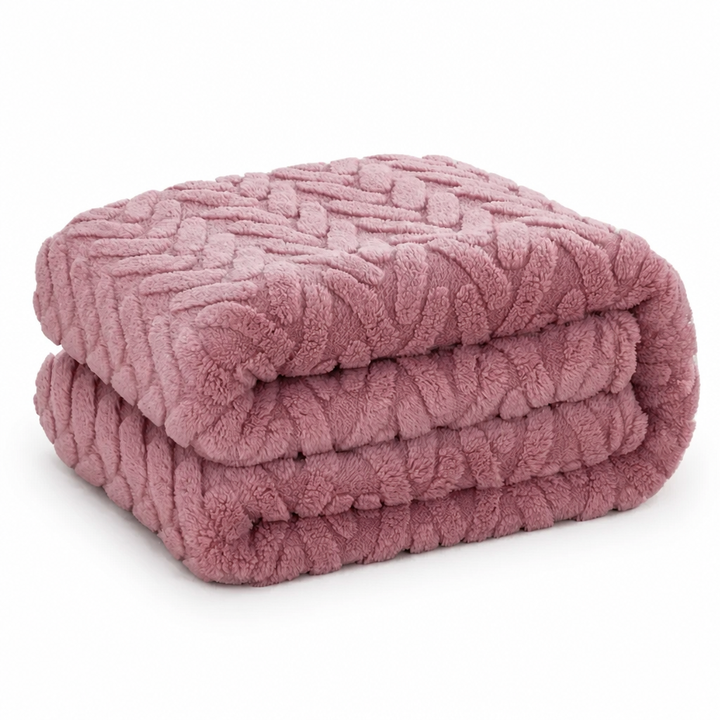 Vendbart fleecepledd i jacquard – én glatt og én myk side
