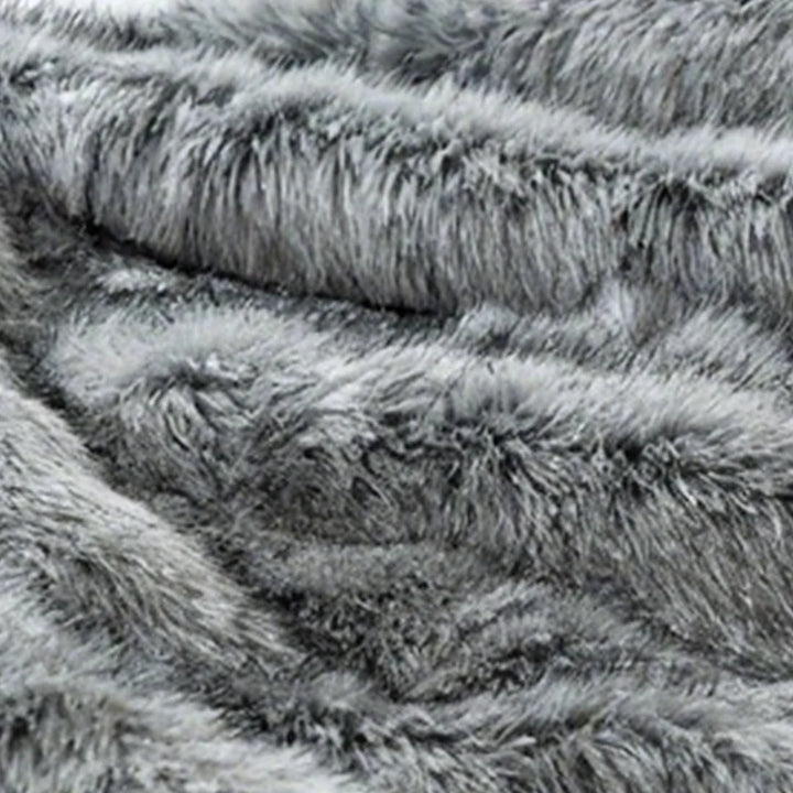 Koslund™ Fluffy pledd i kunstpels med forsterkede kanter