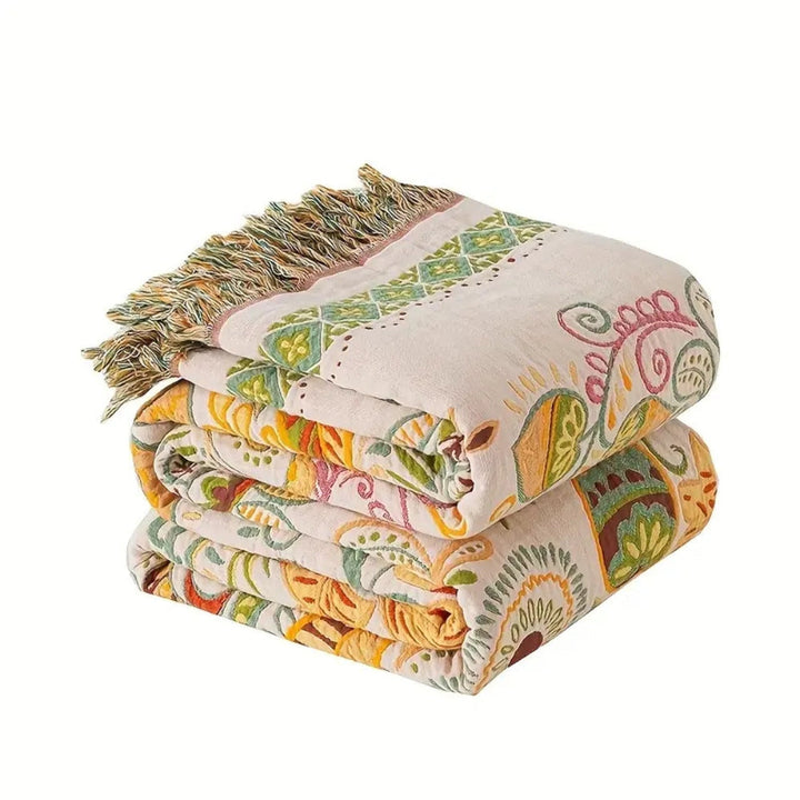 Koslund™ Vendbar boho-pledd med dusker og løvmønster