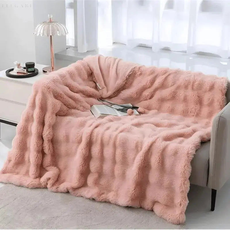 Fluffy pledd med boblestruktur og silkemyk følelse