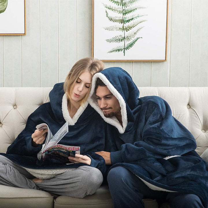 Pleddhettegenser i fleece med stor hette og lommer