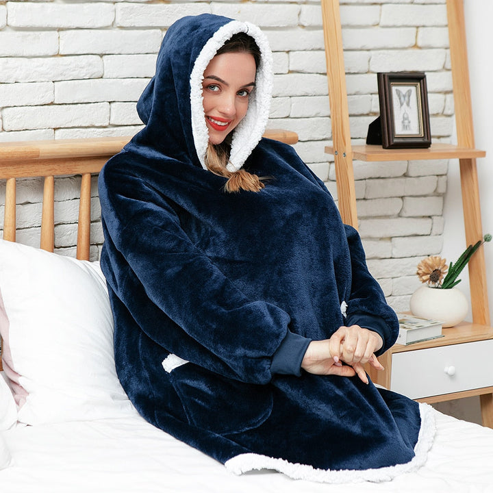 Pleddhettegenser i fleece med stor hette og lommer