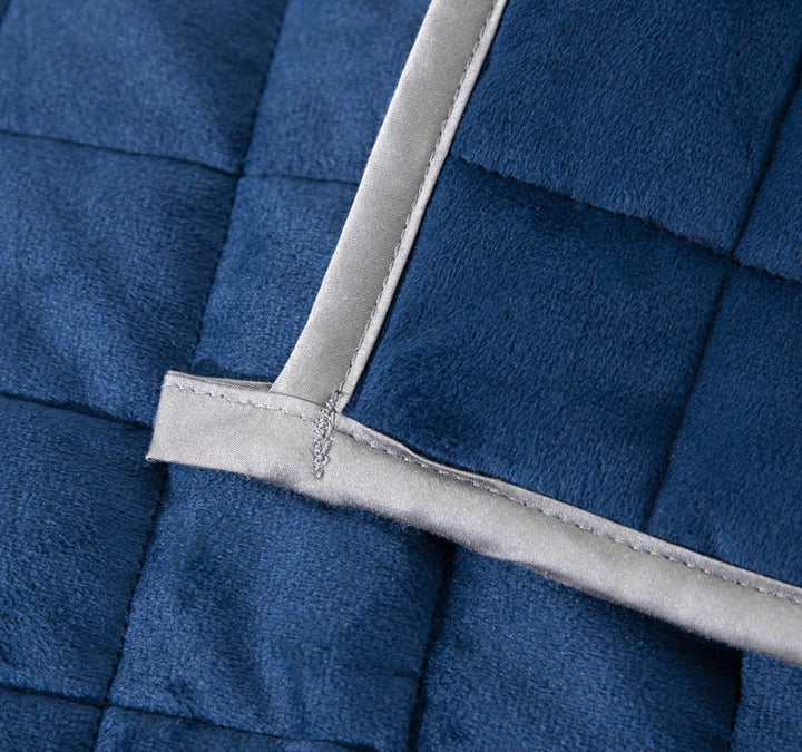 Koslund™ Vendbart quiltet vinterpledd med to lune sider