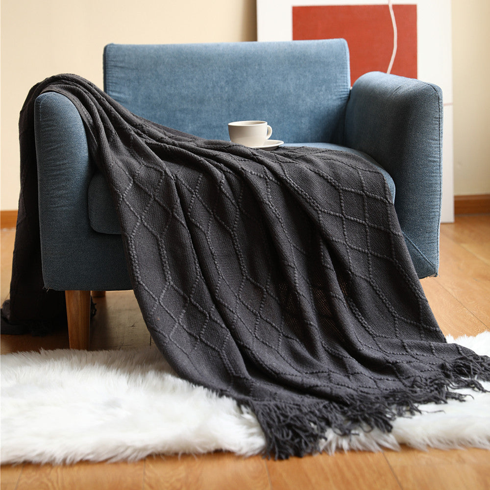 Vevd pledd med struktur i mykt garn til sofaen eller sengen