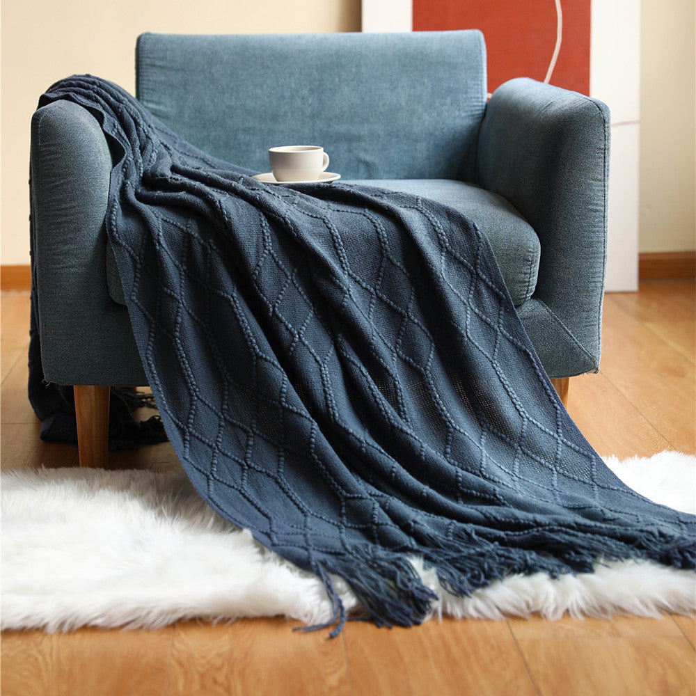 Vevd pledd med struktur i mykt garn til sofaen eller sengen