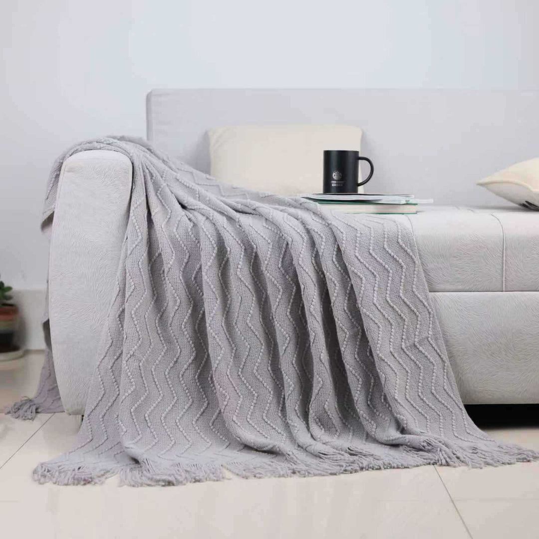 Pledd med struktur til sofa og seng i mykt stoff