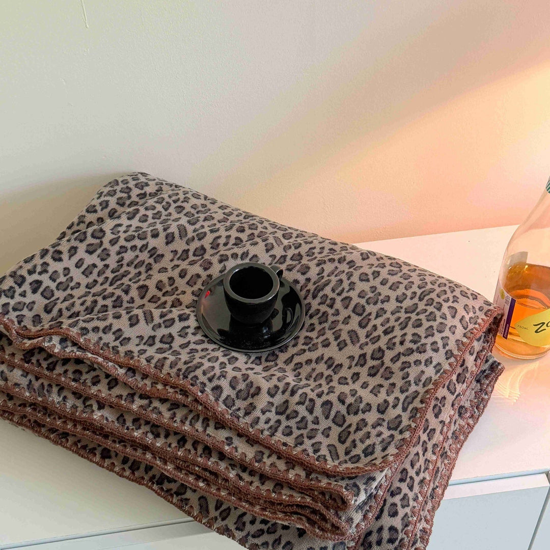 Myk pledd med dyremønster til sofa og seng