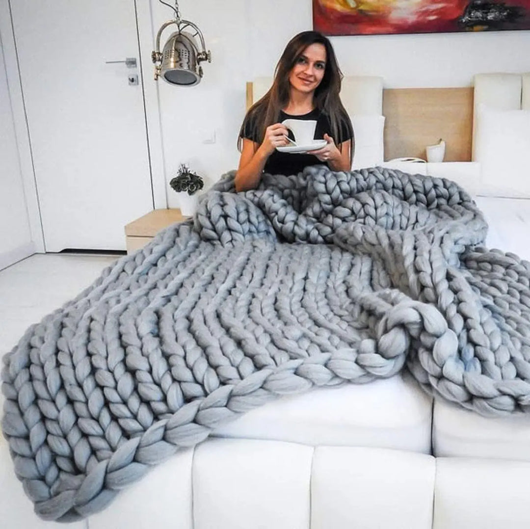 Koslund™ Grovstrikket ullpledd for en koselig sofa og seng