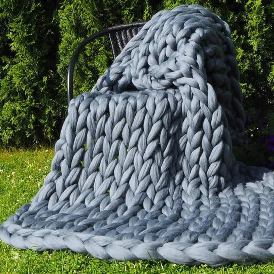 Koslund™ Grovstrikket ullpledd for en koselig sofa og seng