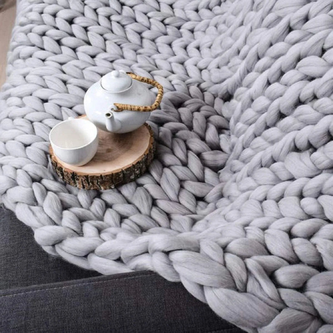 Koslund™ Grovstrikket ullpledd for en koselig sofa og seng