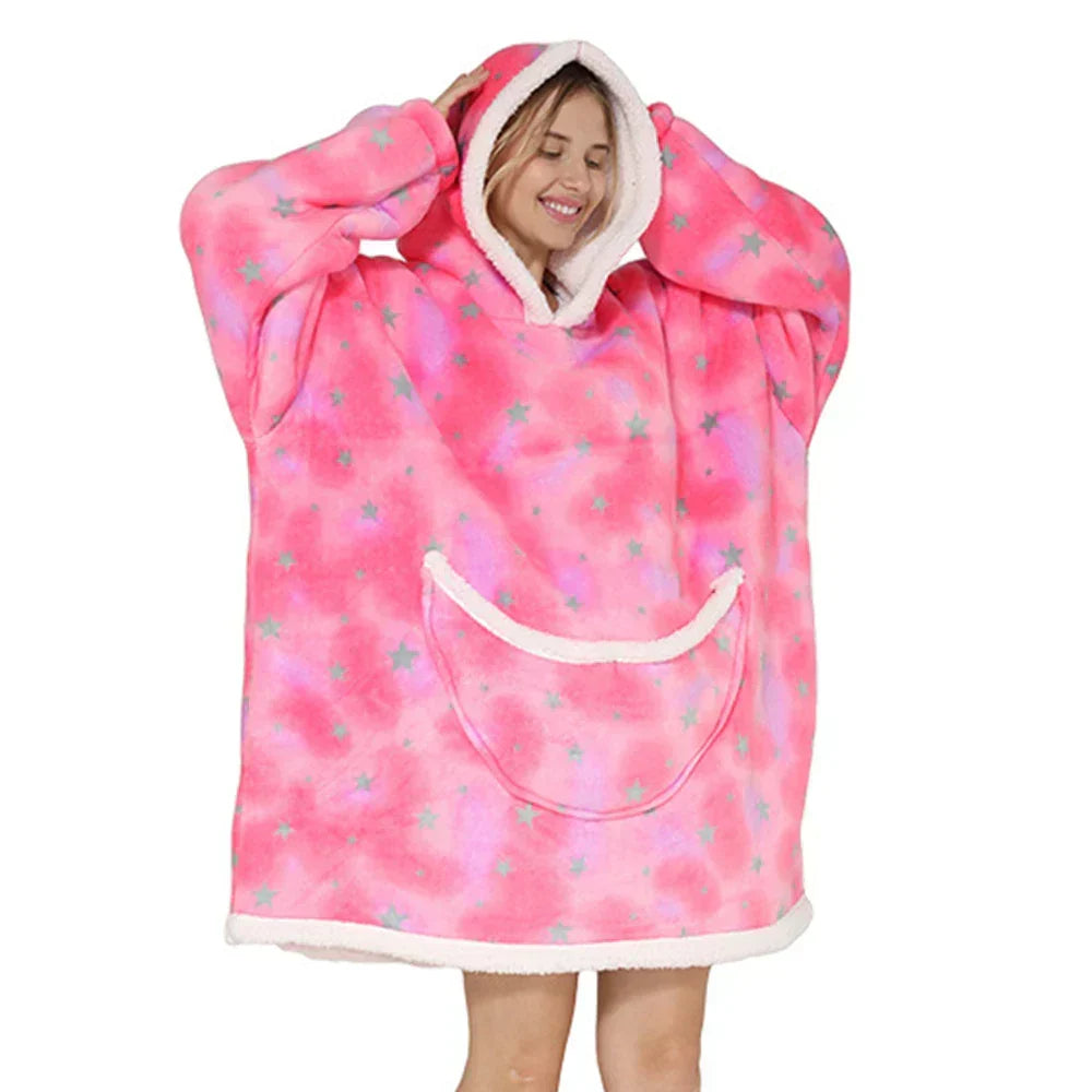 Oversized fleecepledd med hette og romslige lommer