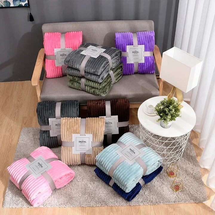 Luftig pledd i flanellfleece med riflet struktur