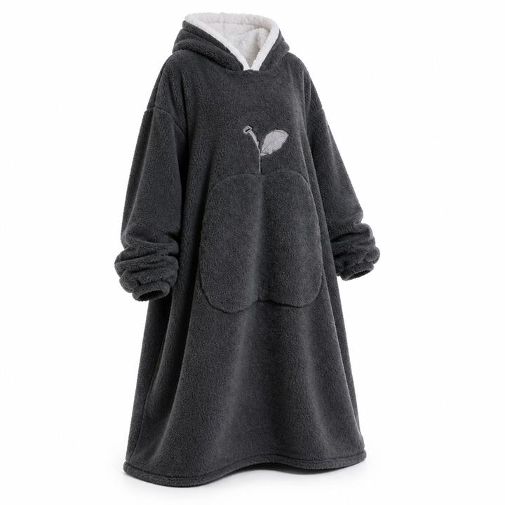 Oversized teppegenser i sherpafleece med ermer og lomme
