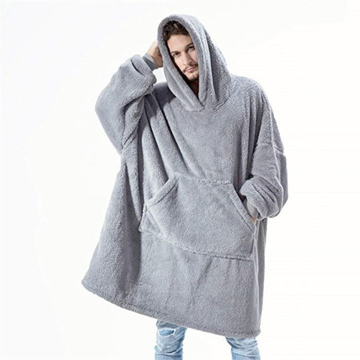 Oversized teppegenser i dobbeltsidig plysjfleece