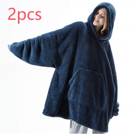 Oversized teppegenser i dobbeltsidig plysjfleece